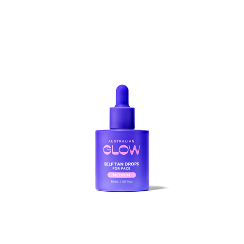 Face Tan Drops dropper bottle on cream background