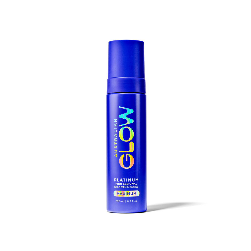 Platinum Maximum Tan cobalt bottle on cream background