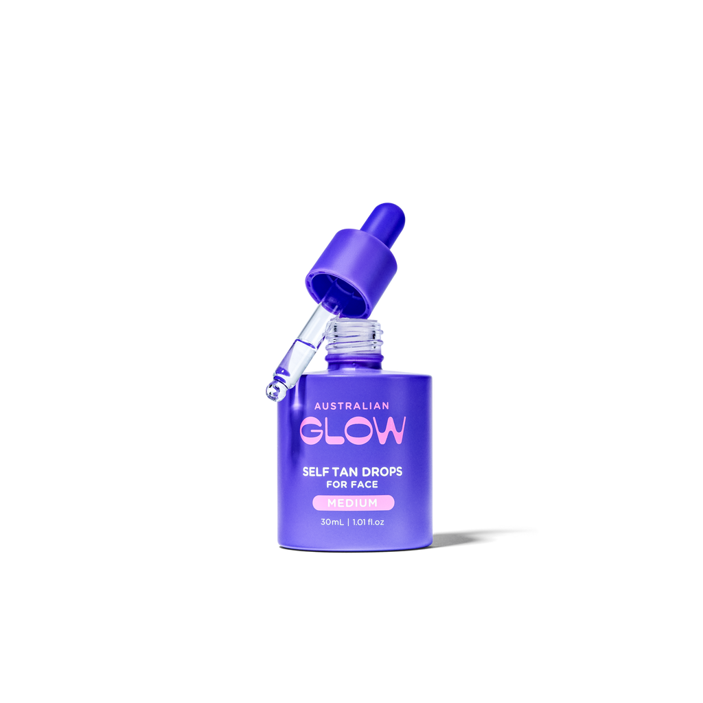Face Tan Drops — Medium with the dropper lifted