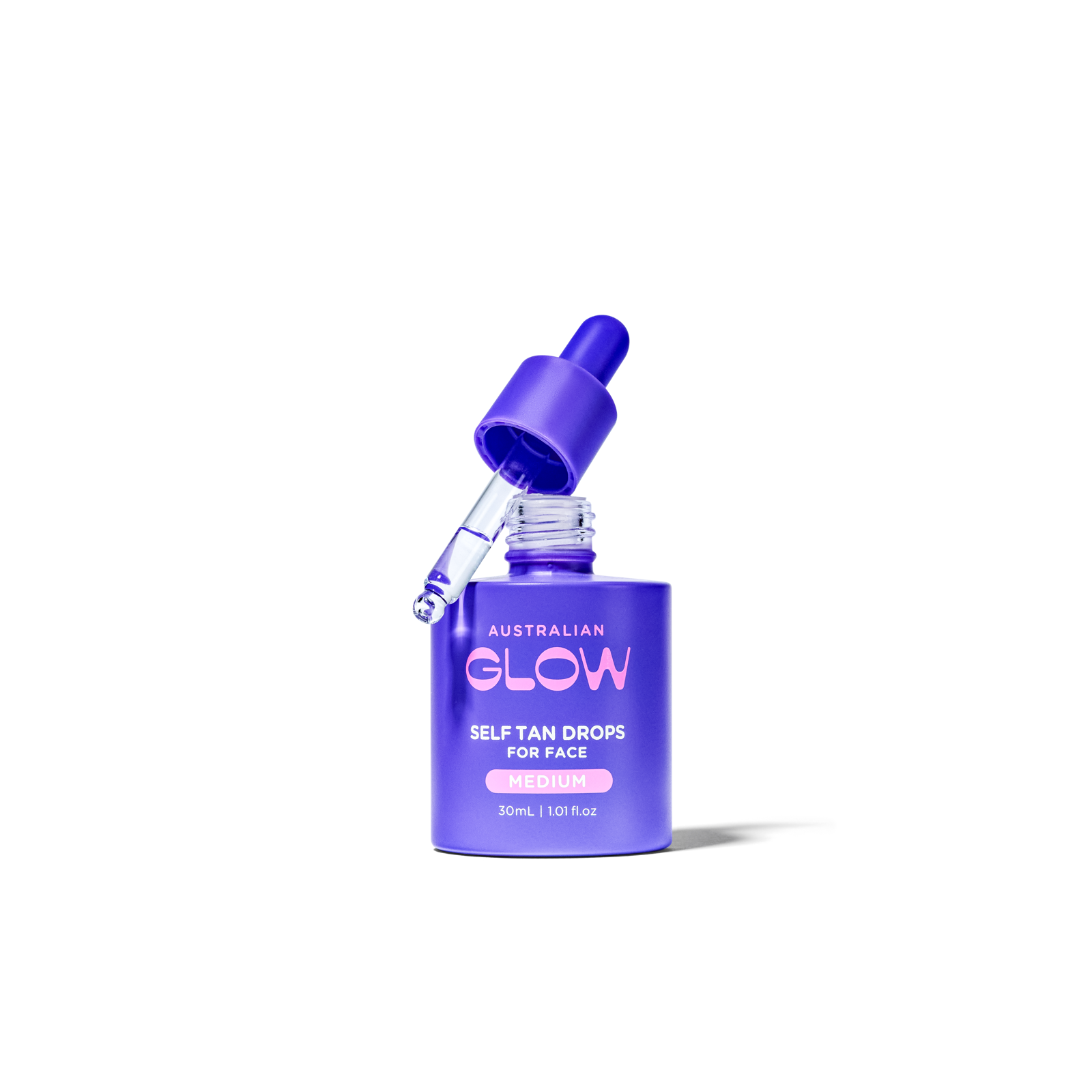 Face Tan Drops — Medium with the dropper lifted