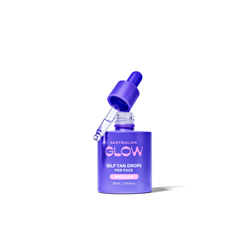 Face Tan Drops — Medium with the dropper lifted